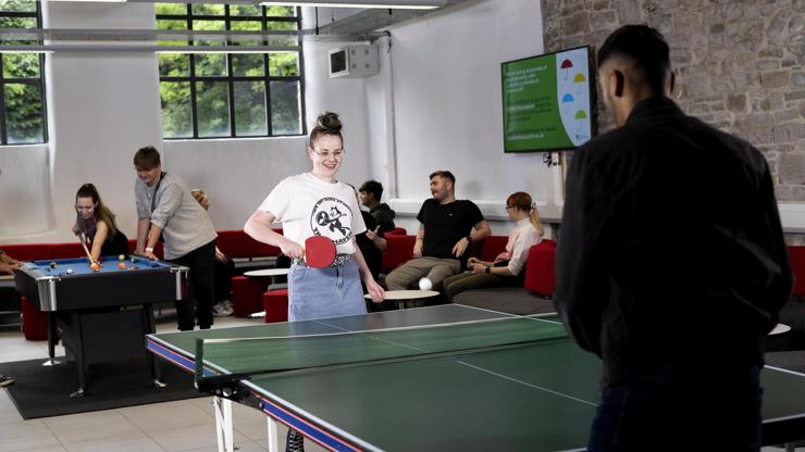 Enjoy a game of table tennis with other students.