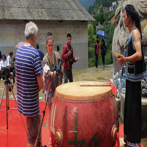 People around large drum in China