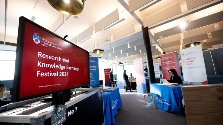 Business stands at the Research and Knowledge Exchange Festival 2024 foyer.