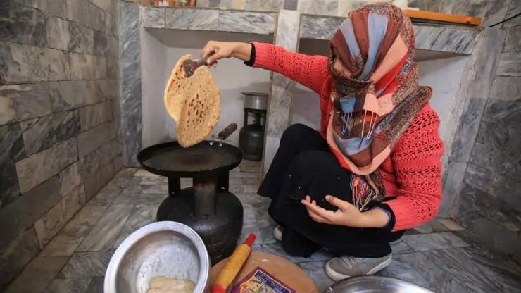 Women in the participating households preparing and consuming bread made from Zincol-2016 flour 