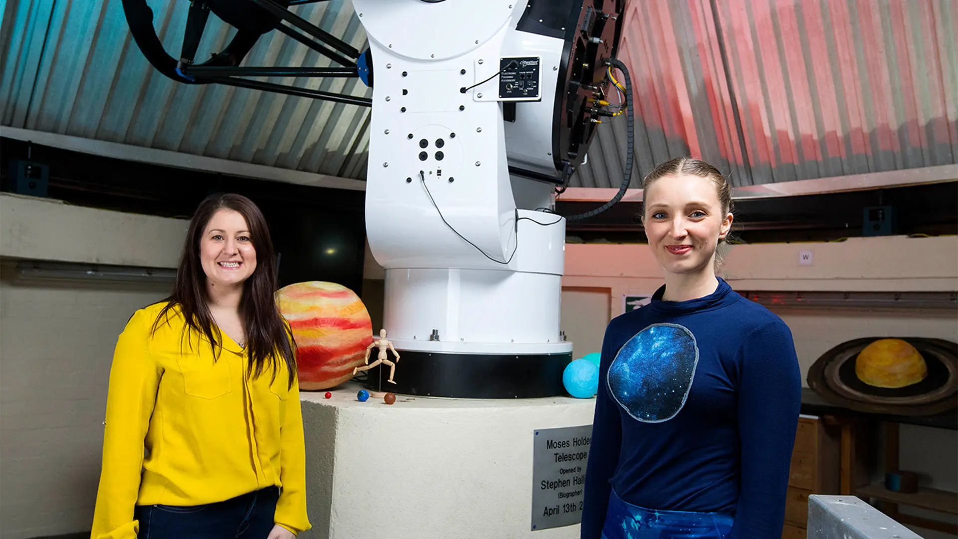 Dr Joanne Pledger and dancer Lucy Starkey in a UCLan observatory