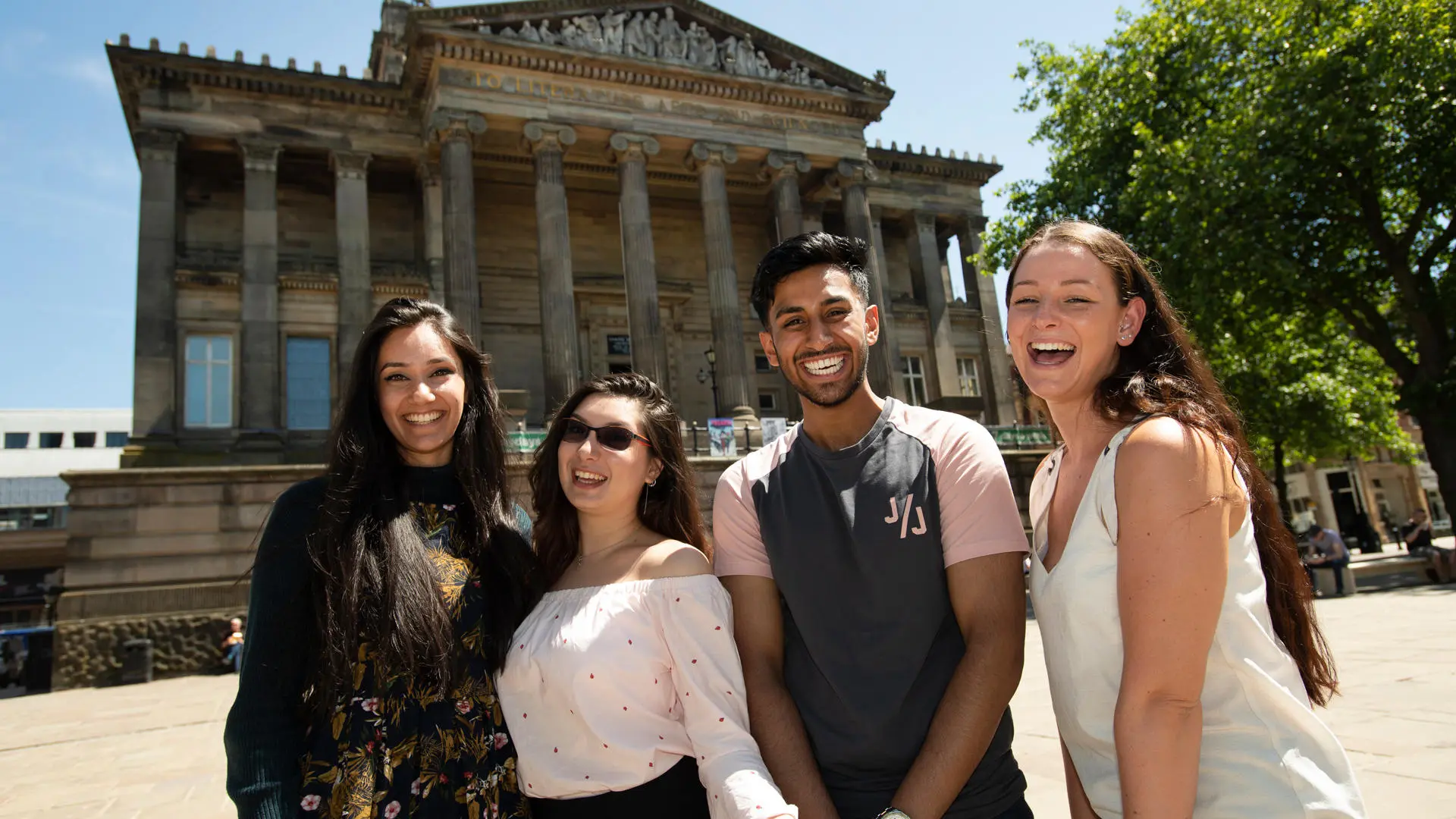 Group of students posing for a group photo in front of the Harris Museum, Preston