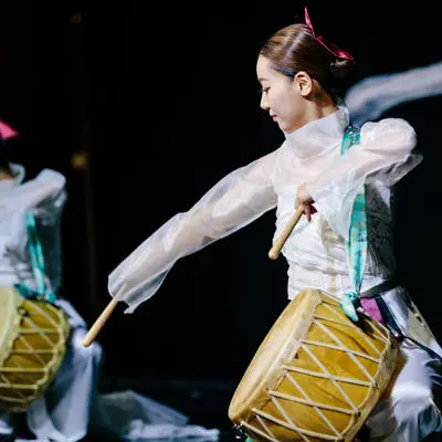 Korean dancers with instruments at the Lancashire Korea festival