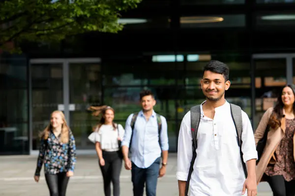 International students walking through campus