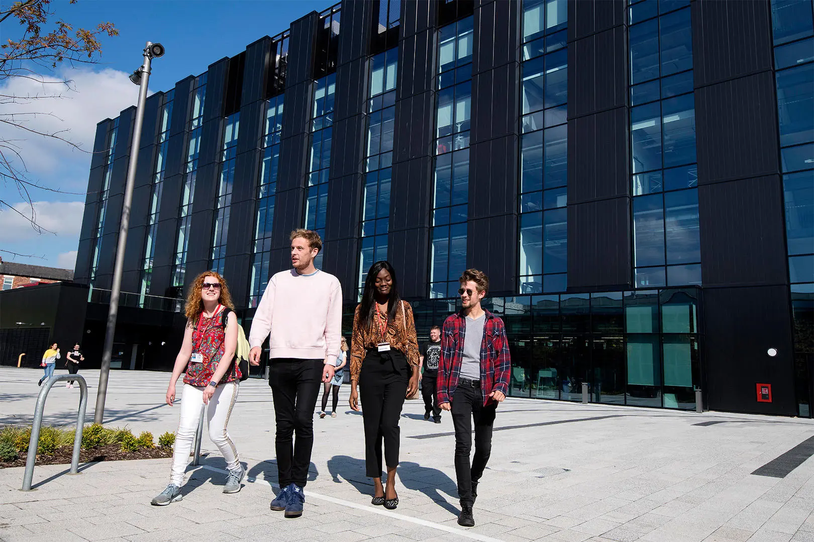 Students walking outside the back of the Engineering Innovation Centre
