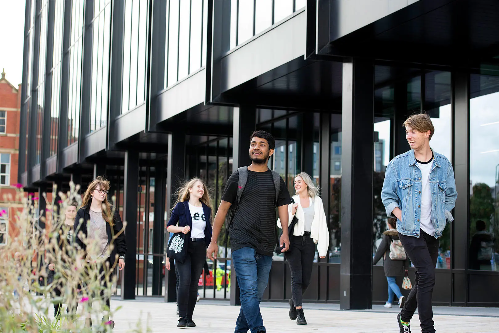 Students walking outside the front of the Engineering Innovation Centre