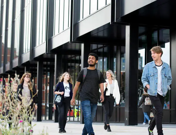 Students walking outside the front of the Engineering Innovation Centre