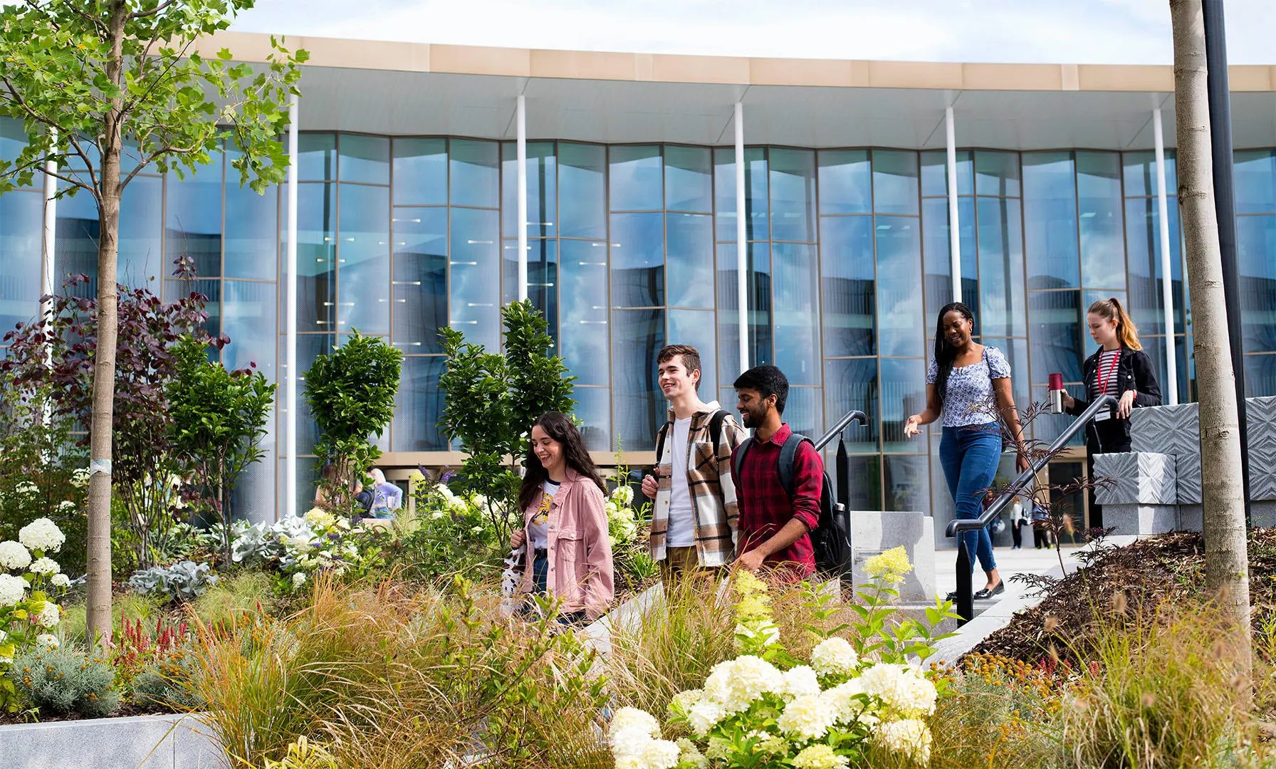 Students walking outside the front of the Student Centre