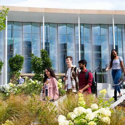 Students walking outside the front of the Student Centre