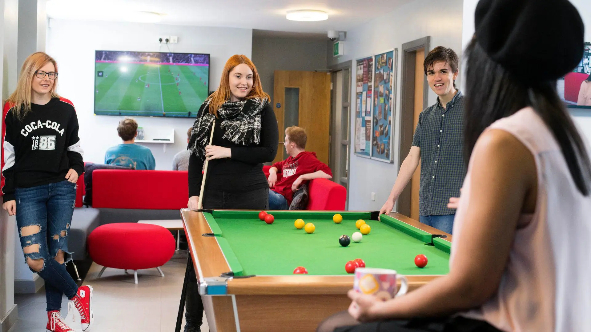 Students in roeburn hall social space