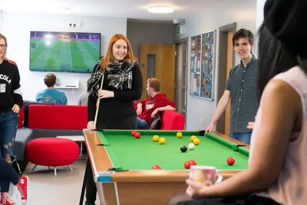 Students in roeburn hall social space