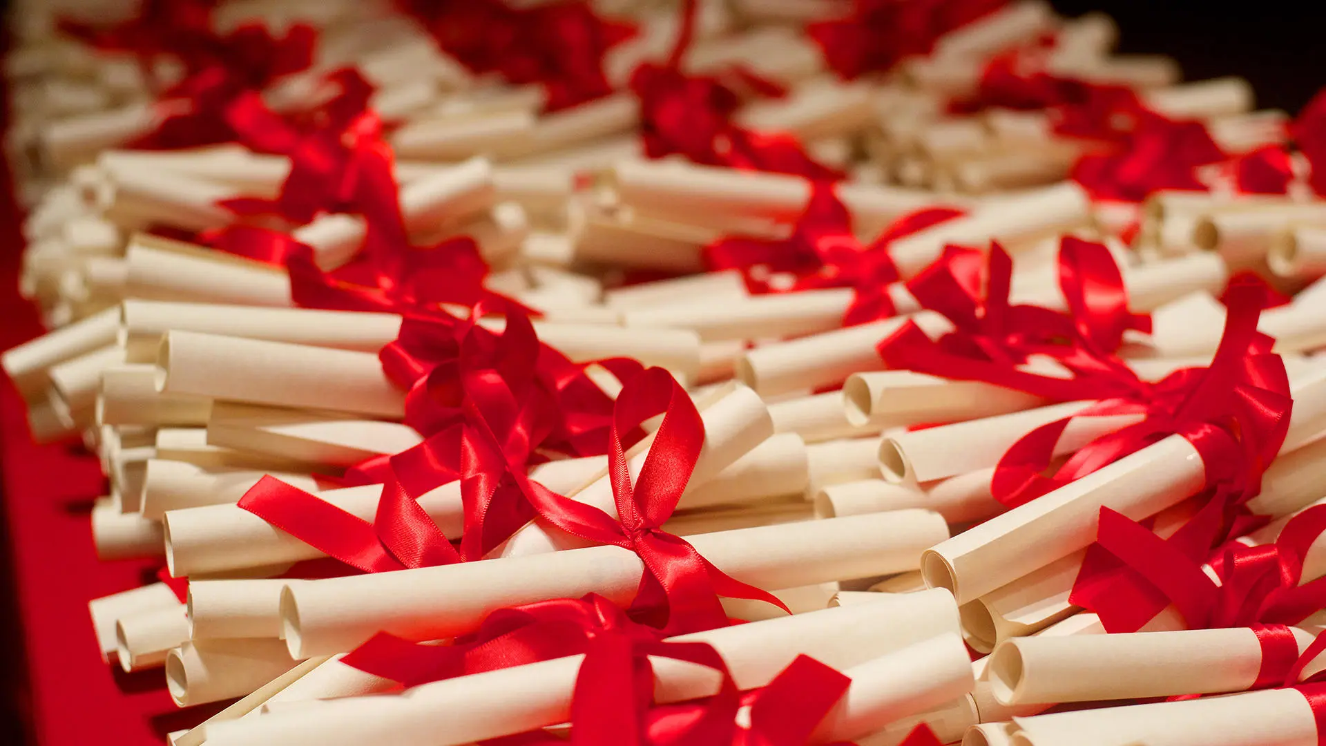 Scrolls with red ribbons