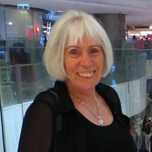 Sandra Walklate in a black blouse smiling