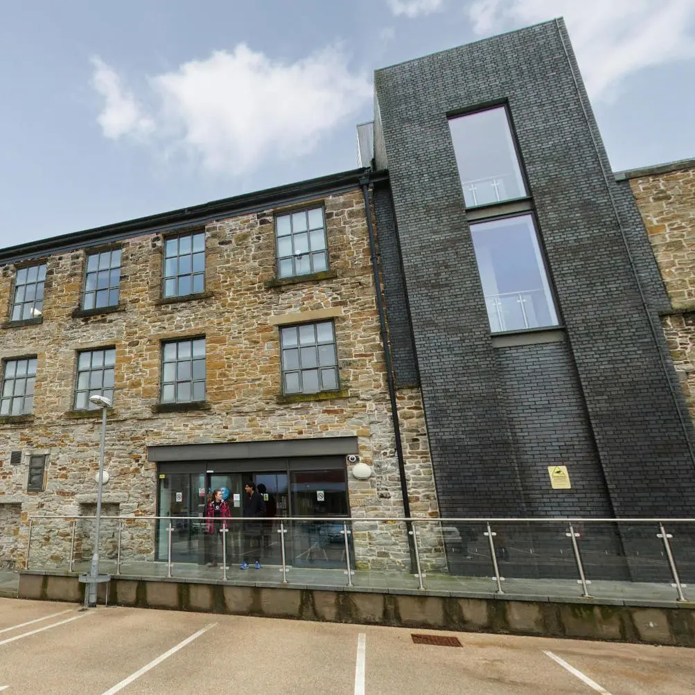 Exterior photograph of Sandygate Mill on UCLan's Burnley Campus.