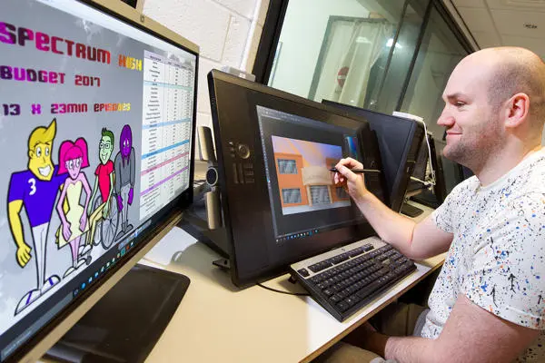 Animation student working on a computer