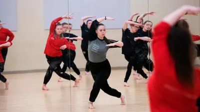 Dancers performing in unison