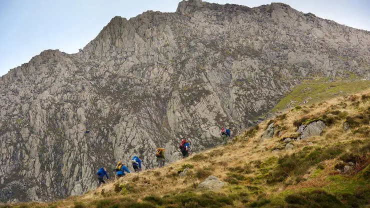 Mountain Medicine students climbing hill in Plas y Brenin in North Wales