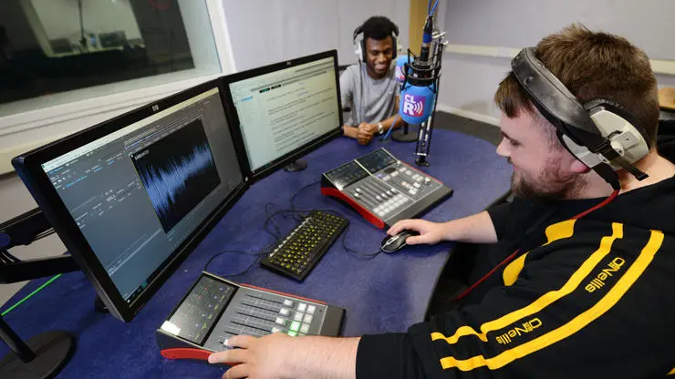 Sports Journalism student in recording studio