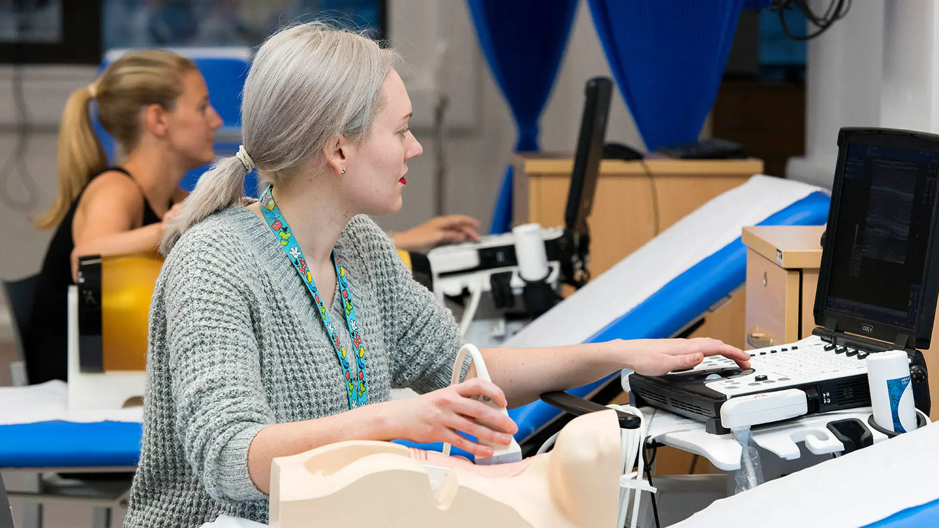 Medical student using ultrasound equipment in the clinical skills lab