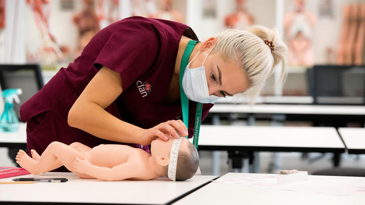 Student and academic working in anatomy facilities