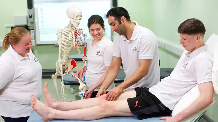 Physiotherapy students learn hands-on.