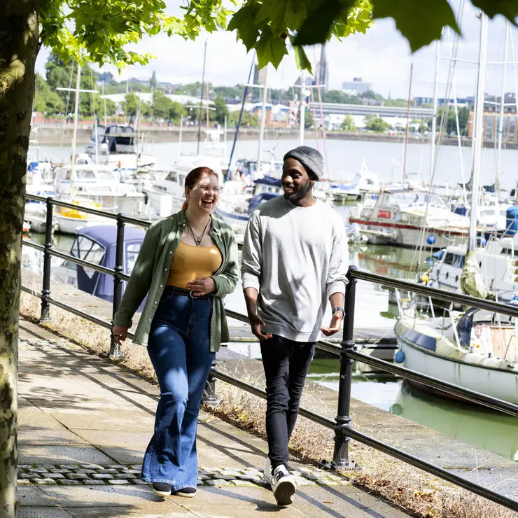 Stroll with friends alongside Preston Marina, home to a dockside cafe and shops.