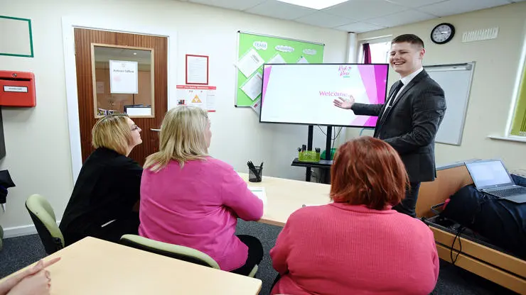 Employee presenting to group