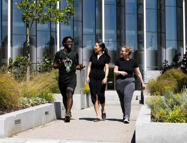 Students walking in front of the Student Centre