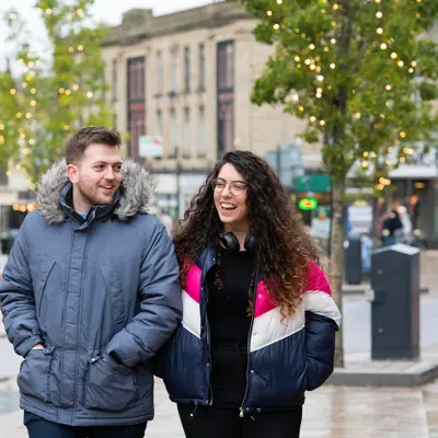 Students walking through Burnley town centre