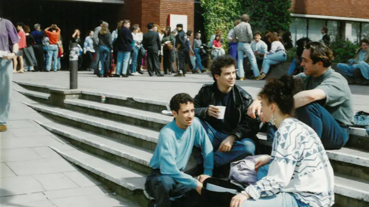Students relaxing outside the Library Building