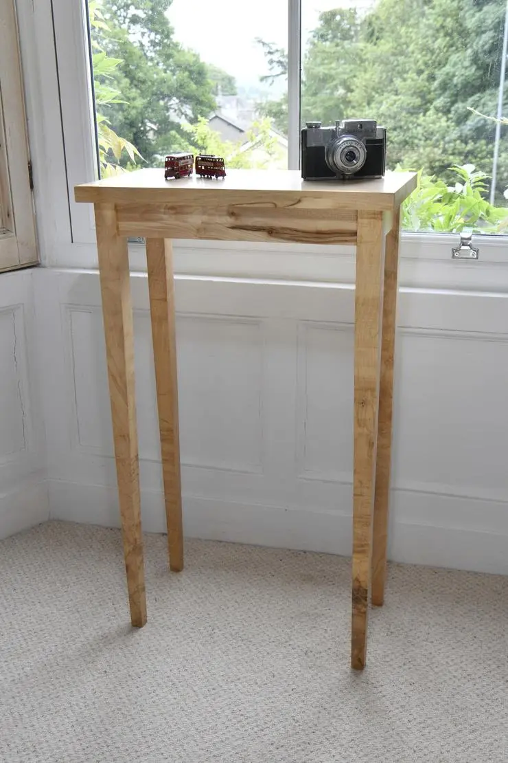 Image produced from actioning the research methodologies with an artisan carpenter case study. A bespoke hand-crafted sycamore table, using semiotic signifiers to give narrative to the product.
