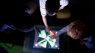 Students using interactive technology
