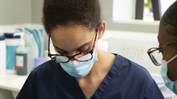 Dentistry student Annabelle Morton performs a procedure