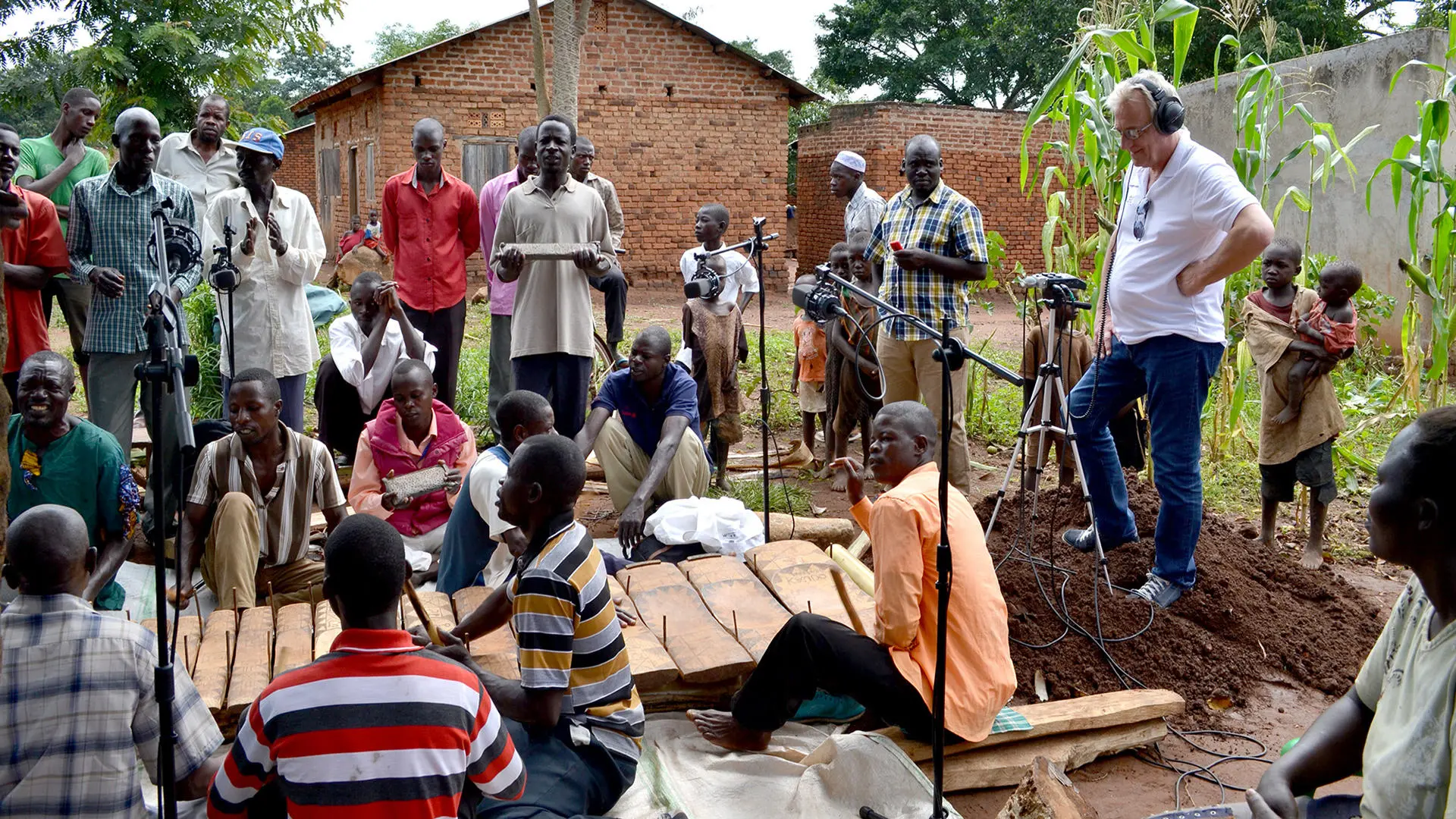 People sitting around in Ugandan village