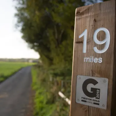 Sign for the Guild Wheel cycling route in Preston
