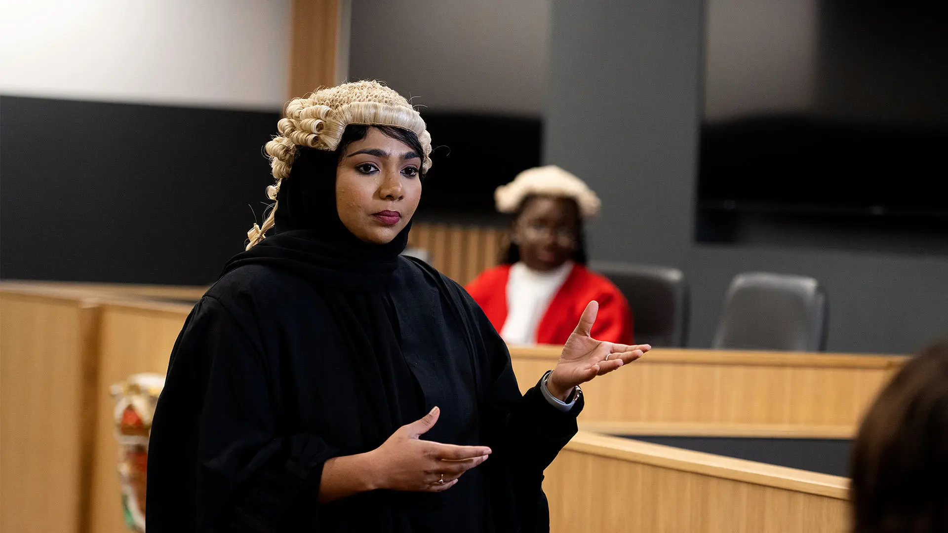 Student acting as a barrister in the moot court room