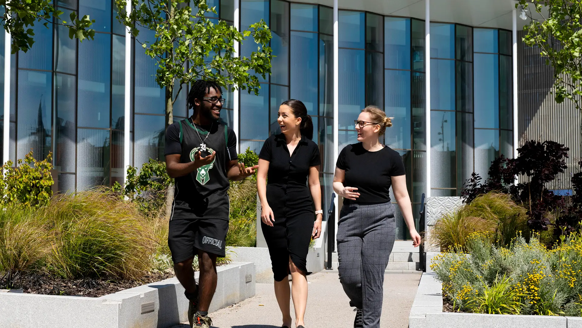 Students walking by the Student Centre on Preston Campus