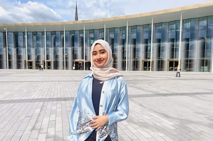 Shehzeen outside the Student Centre at our Preston Campus