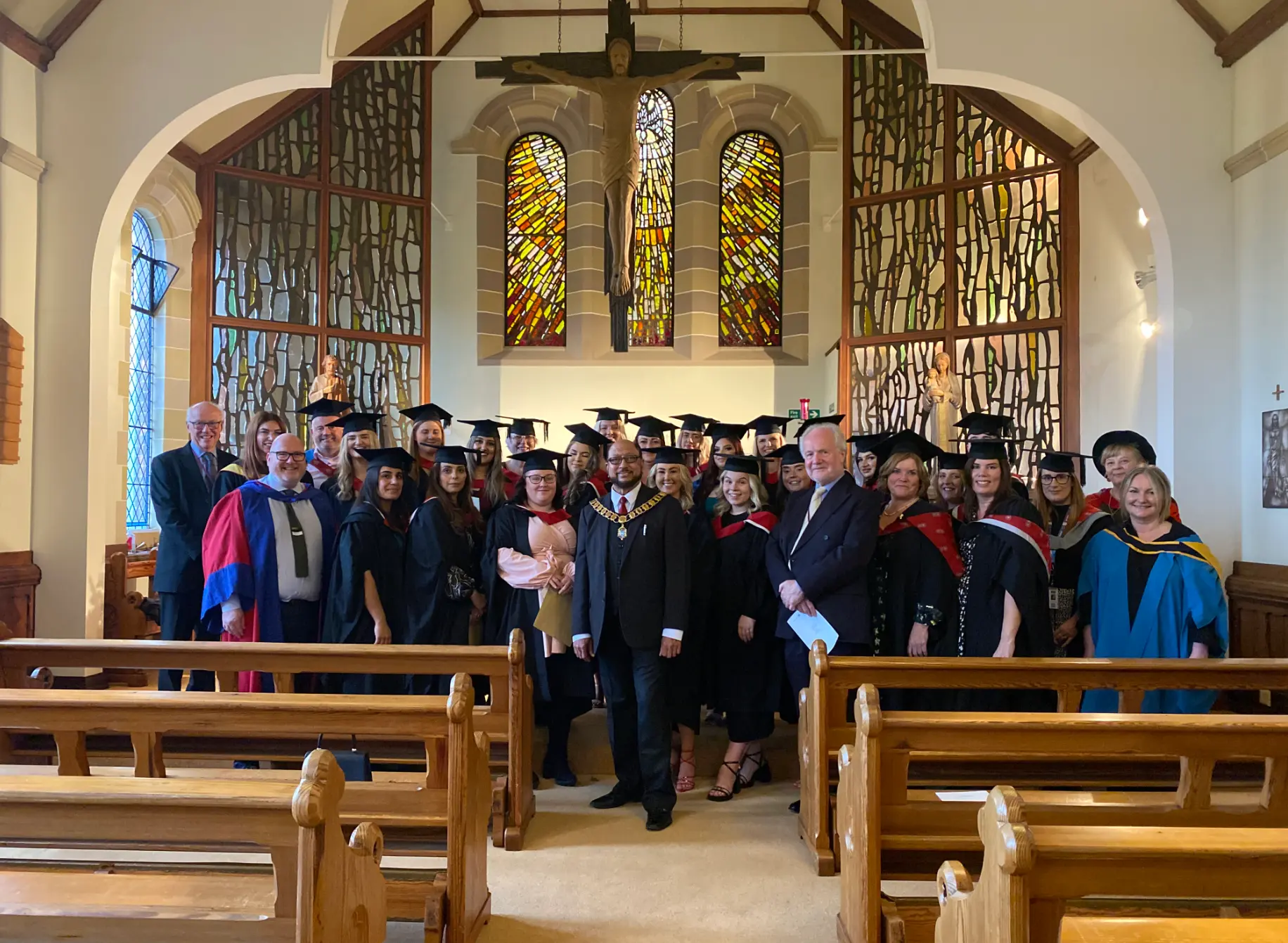 Group photo of graduates at Cardinal Newman College.