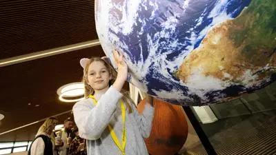 lsf-child-with-globe