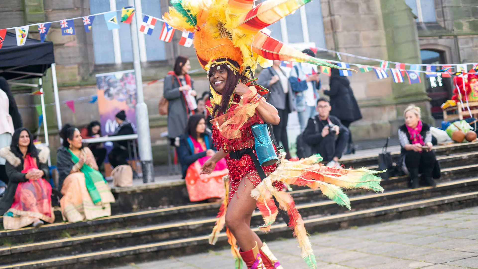 Woman dancing in carnival outfit