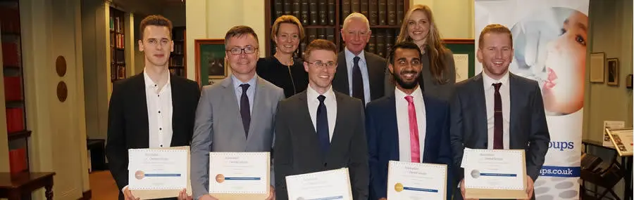 Alan Lyons (second left) awarded a bronze award from the Association of Dental Groups for writing an essay on how his role fits into the mix of skills needed to deliver an all-round good quality dental service.