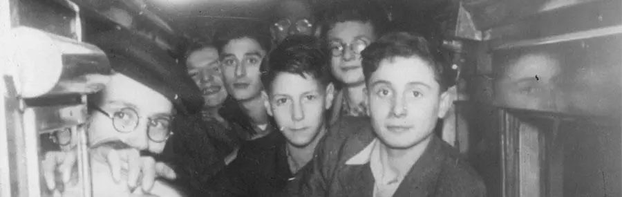 Jewish refugee children on a train from Berlin to the Netherlands after passing the German border