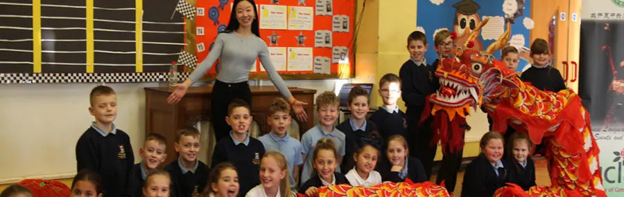 Year Five pupils were treated to Chinese brush painting, calligraphy and dragon dancing.