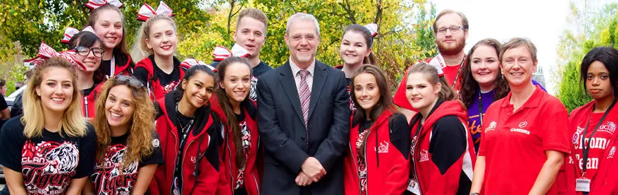 University of Central Lancashire Vice-Chancellor Mike Thomas with members of the cheerleading squad