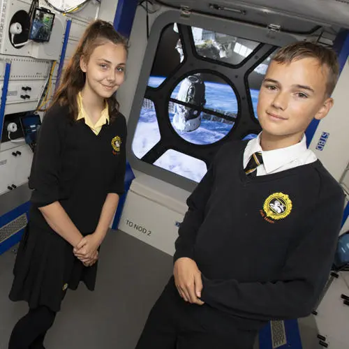 Cerys Tearle and Josh Simpson enjoy the Space Bus.