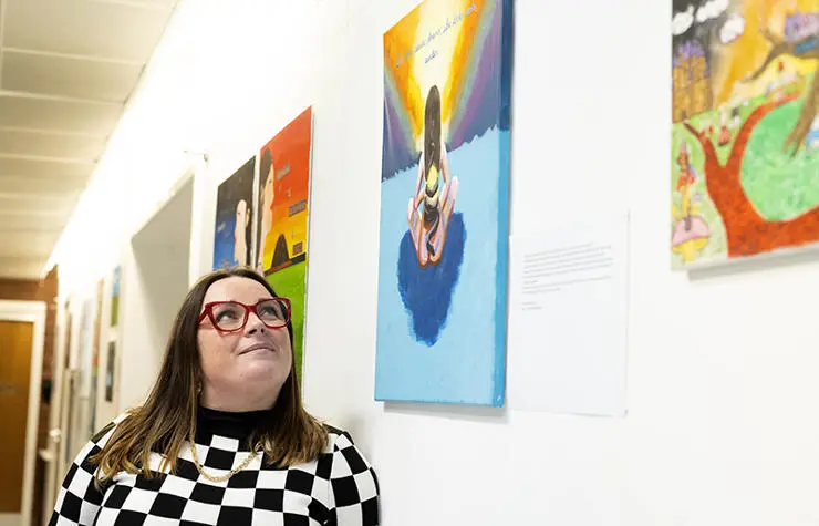 2.	BSc (Hons) Coaching, Counselling and Psychological Interventions student Hannah Mclachlan with her exhibition work.