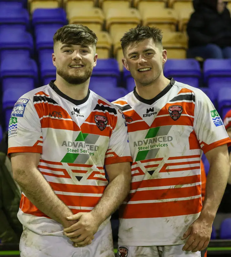 Jacob (left) and Joe in their Salford Red Devils kit.