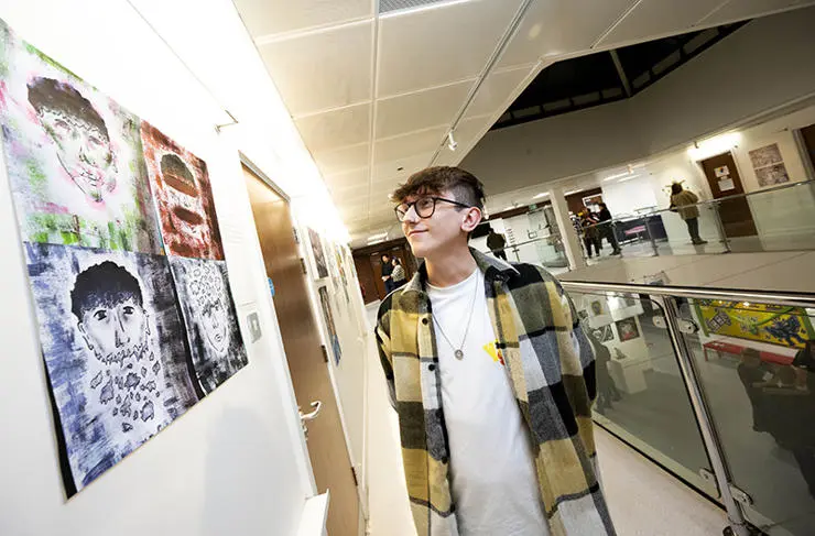 3.	BSc (Hons) Coaching, Counselling and Psychological Interventions student Jaden Piggot with his exhibition work.