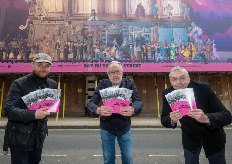 From left to right - Jonny Davenport, Old Courts, Jim Meehan, Wigan Local History and Heritage Society and 
Phil Machin, Senior Heritage Action Zone Officer for Wigan Council, on King Street.
